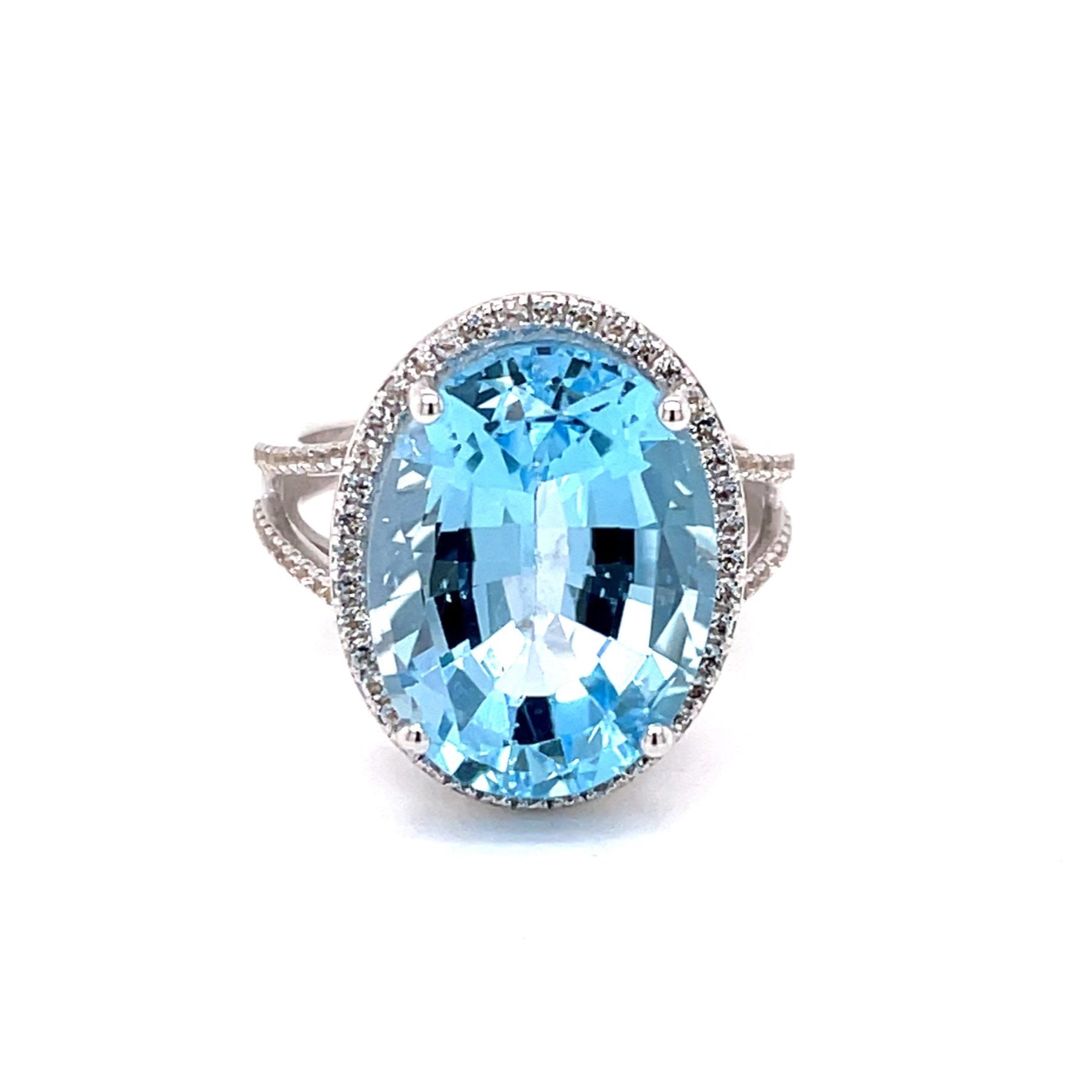 Златен пръстен със син и бял топаз